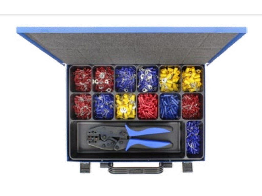Assortment set of insulated cable lugs with crimping pliers and stripping pliers in metal box